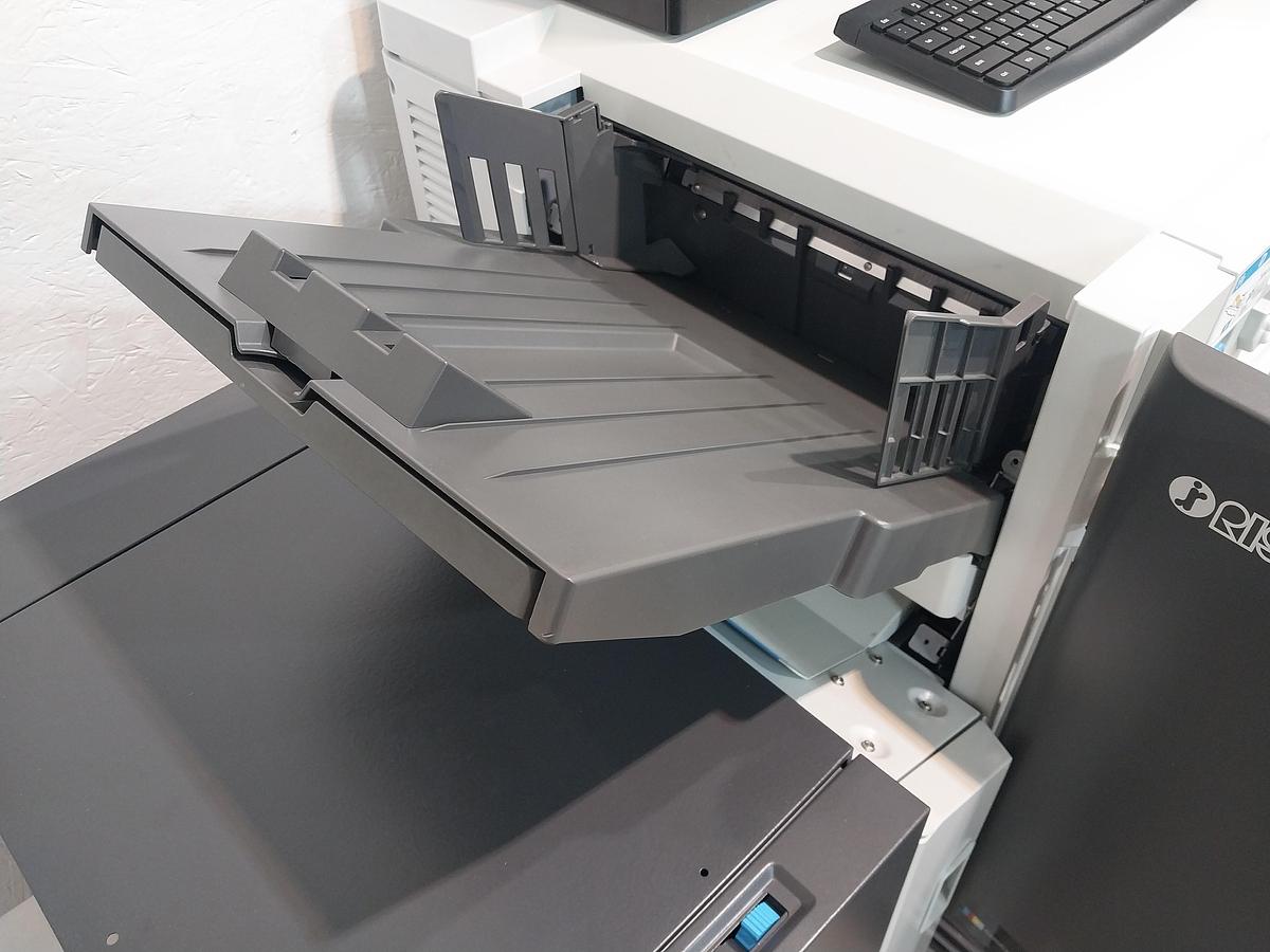 Riso ComColor GL7430 Full-Color Inkjet Printer. Configured with a High-Capacity Feeder, FS2100c Fiery Controller, and Wide Stacking Tray
