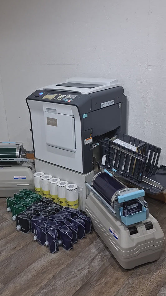 Duplo DP-X850 Digital Duplicator with Three Print Cylinders, Extra Supplies and Stand. Only 130K Total Prints!